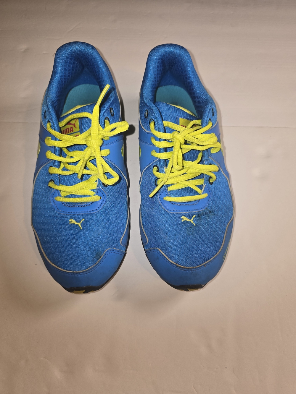 Puma Womans Bright Blue Sneakers with Yellow Laces